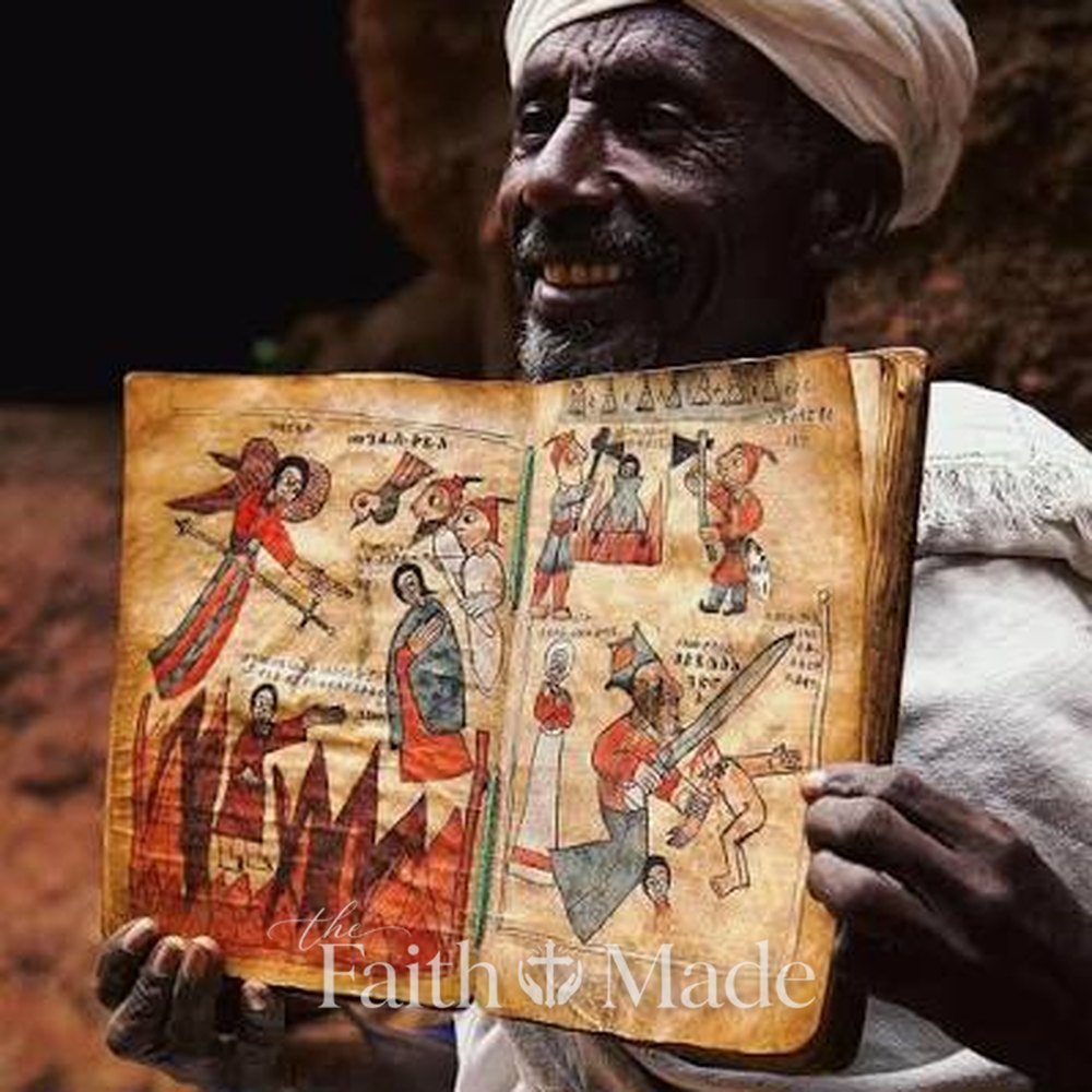 Ethiopian priest holding an illuminated Geʿez manuscript